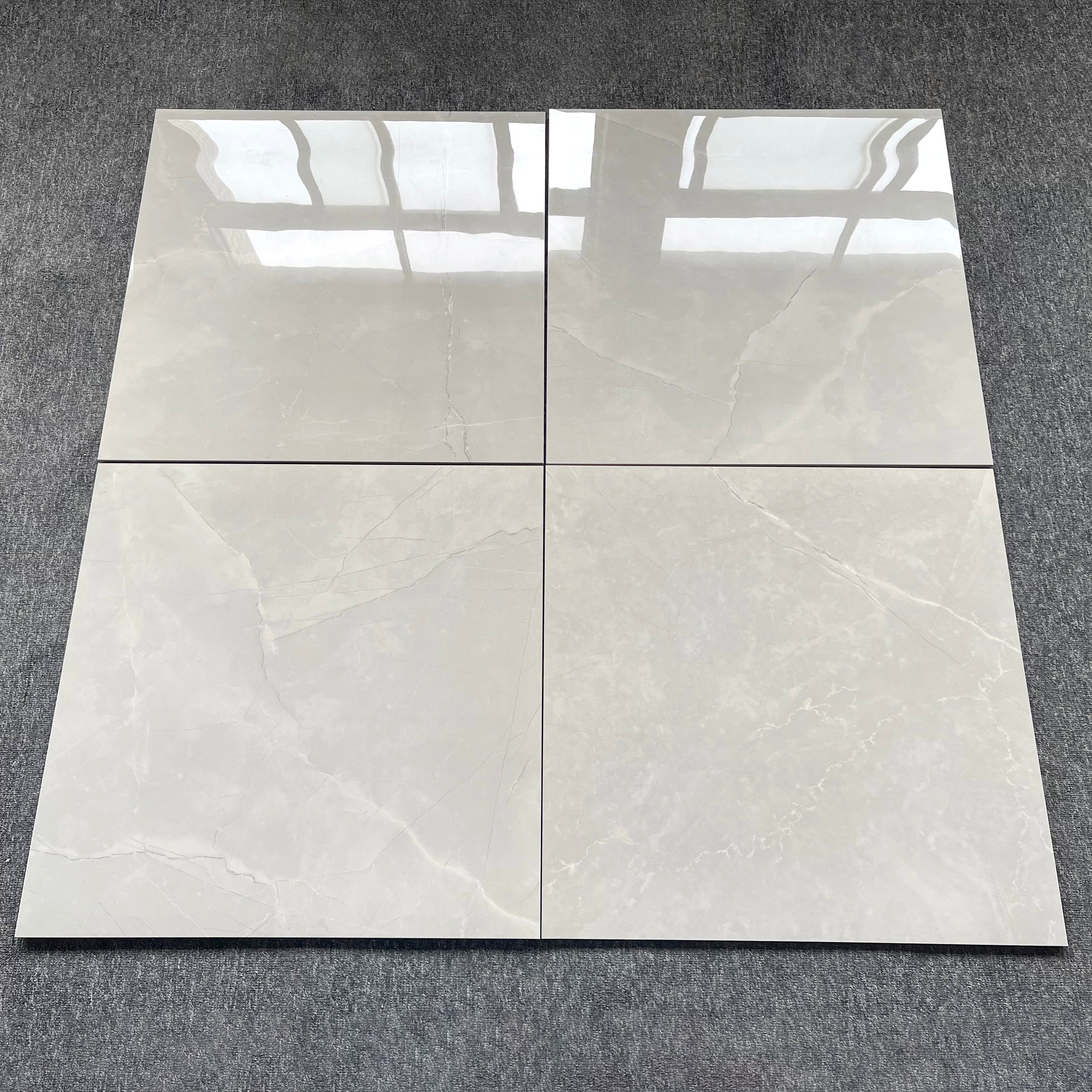 $11.900 por m²<br>Porcelanato Marfil Marmoleado Brillante 60x60<br>Caja de 1.44 m²